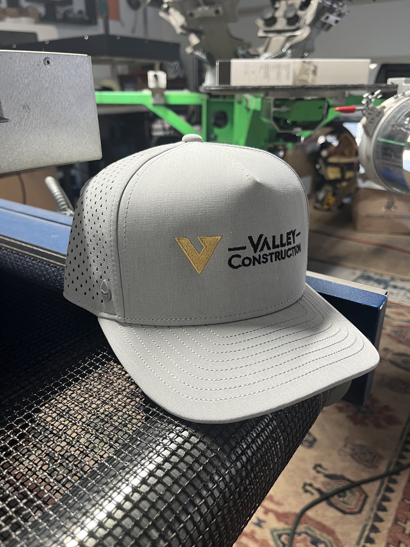 Gray performance cap embroidered for Valley Construction